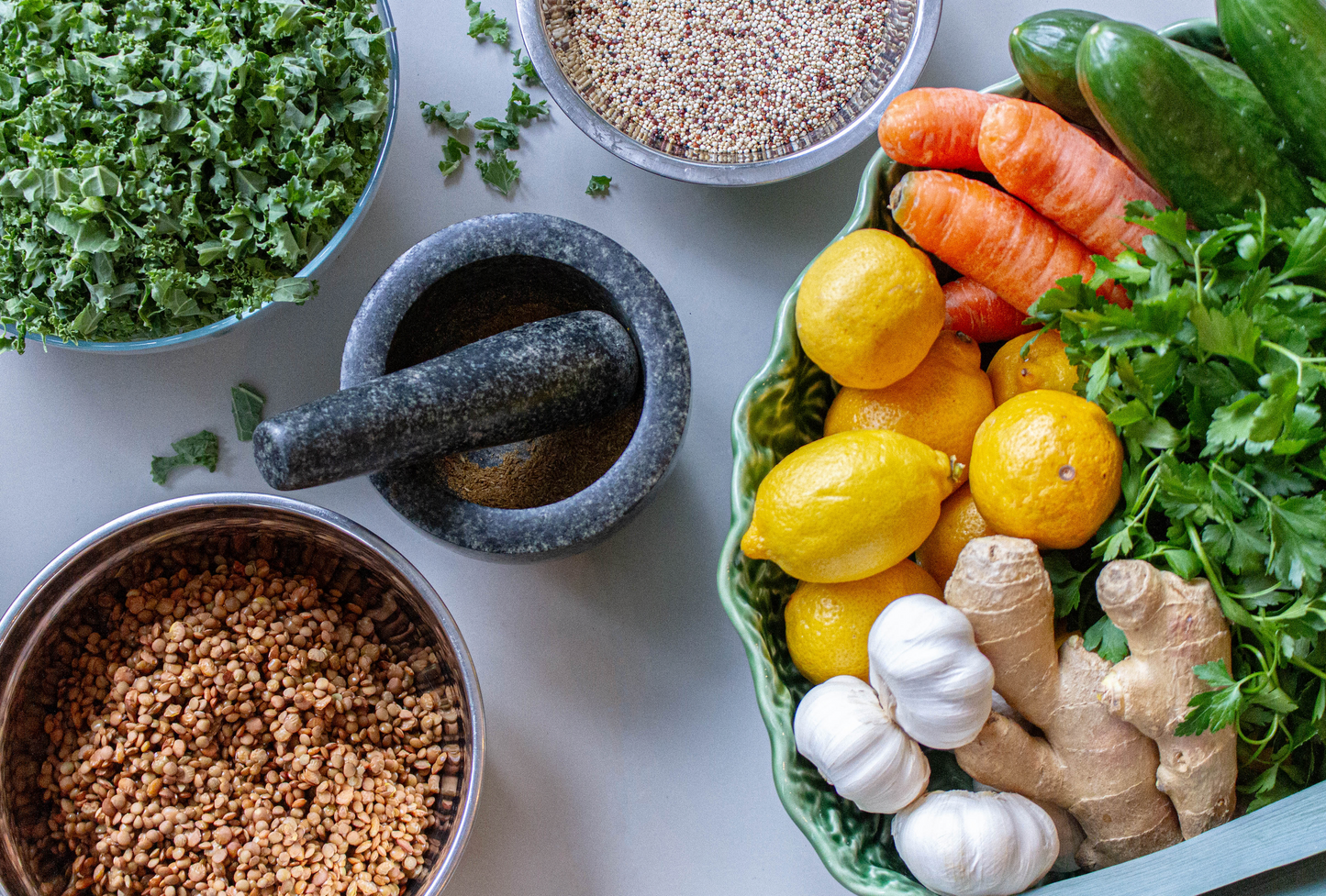 Vegetables bowls, lemon, cucumber, and more food