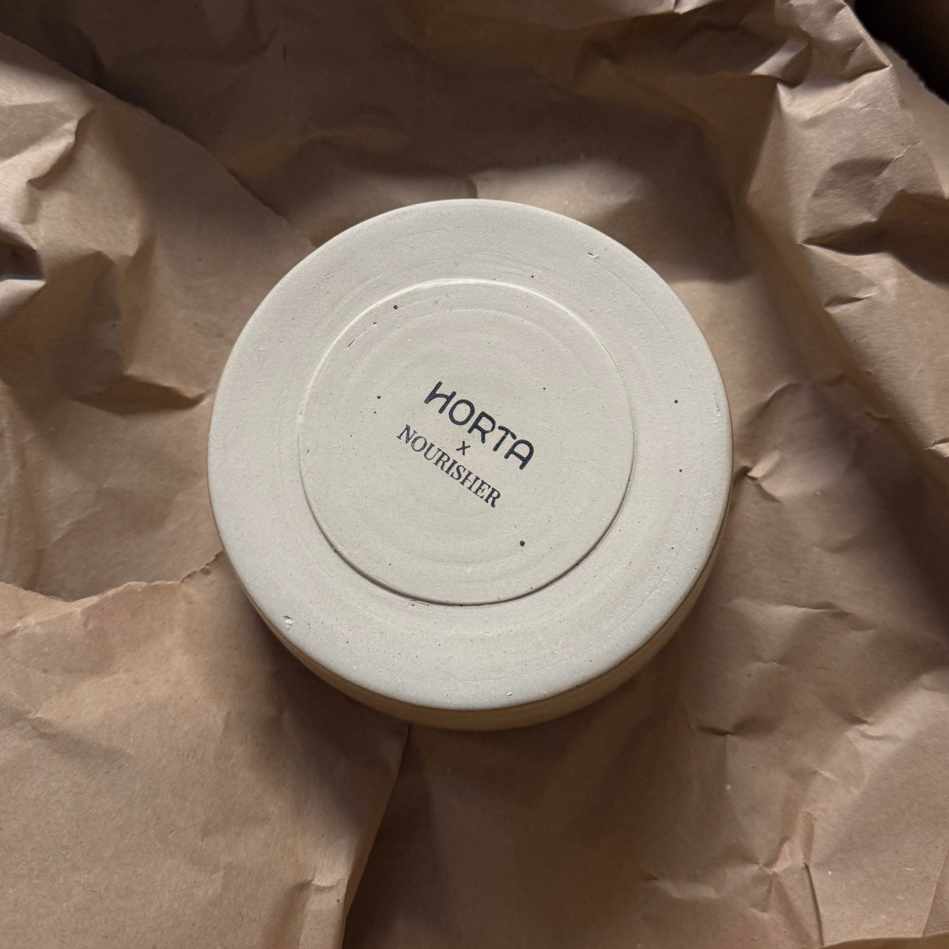 Limited Round Ceramic bowl in beige, made by Horta Ceramics for Nourisher Meals